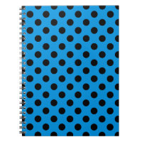 Svarta polka dots på blått himlar