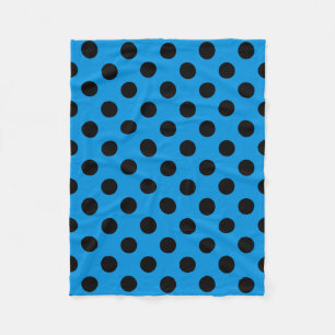 Svarta polka dots på blått himlar fleecefilt