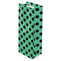 Svarta polka dots på mynta grönt