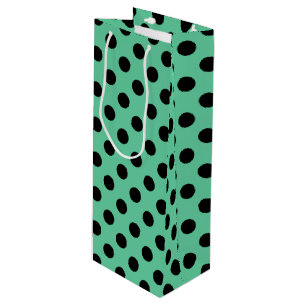 Svarta polka dots på mynta grönt
