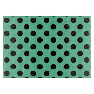 Svarta polka dots på mynta grönt