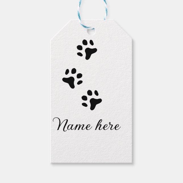 Svartdjuret hund lägger till tass-foto till tass presentetikett (Framsidan)