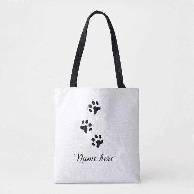 Svartdjuret hund lägger till tass-foto till tass tygkasse (Framsida)