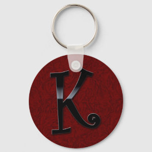 Svarten kommenterar Monogram - K Nyckelring