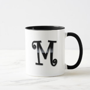 Svarten kommenterar Monogram - M Mugg