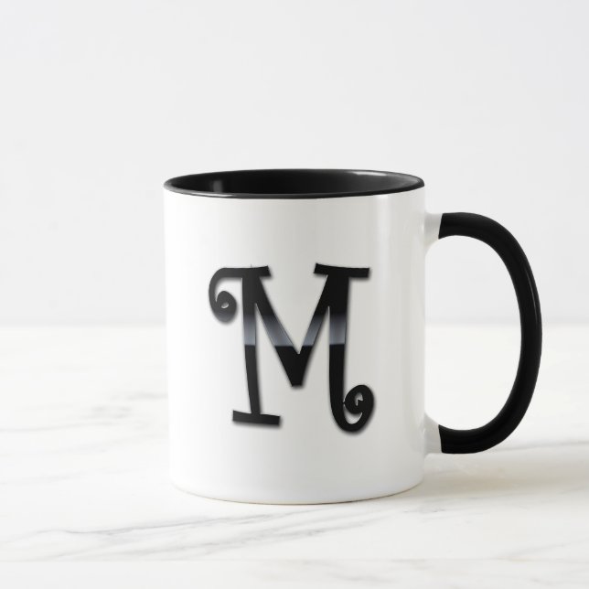 Svarten kommenterar Monogram - M Mugg (Höger)