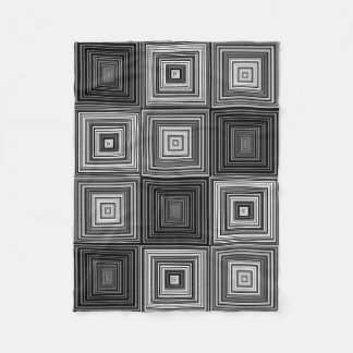 Svarten, vit och grått kvadrerar filten fleecefilt