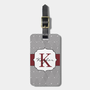 Svarten & vit virvlar runt den Marsala monogramen Bagagebricka
