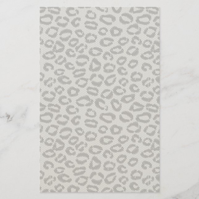 Svartnät snöre med leopard mönster på vitt brevpapper (Framsida)