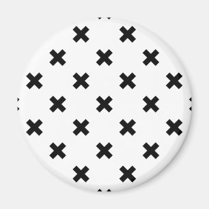 Svartpolka kor på vit magnet