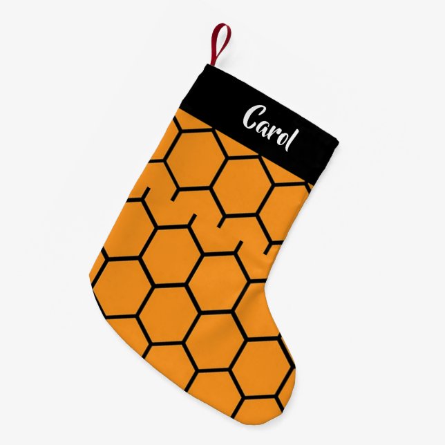 Svartstängsel på orange liten julstrumpa (Framsidan (Hängande))