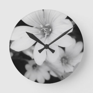 Svartvit blomma rund klocka