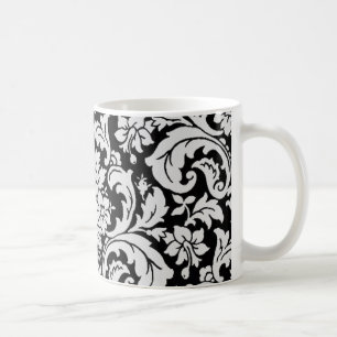 Svartvit blommigt kaffemugg