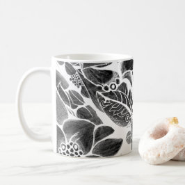Svartvit blommigt kaffemugg