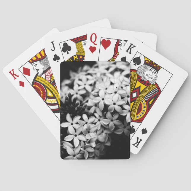 Svartvit blommor casinokort (Baksidan)