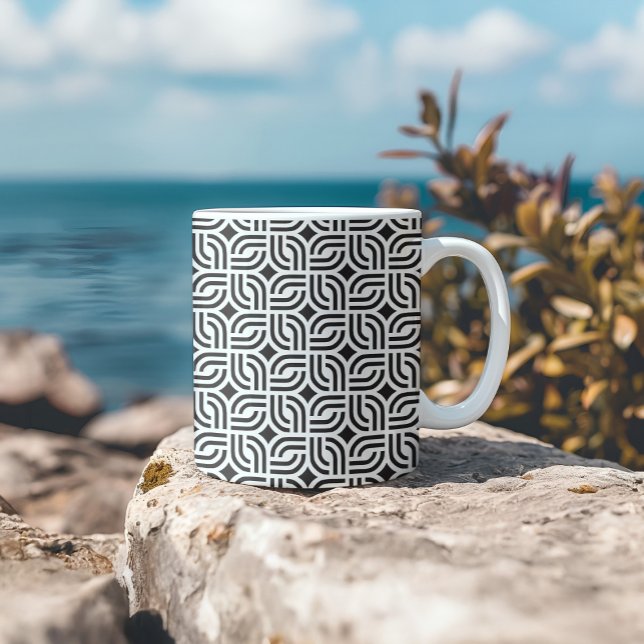 Svartvit dekorerad mönster-antik kaffemugg (Skapare uppladdad)