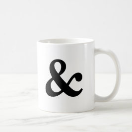 Svartvit et-teckenmugg kaffemugg