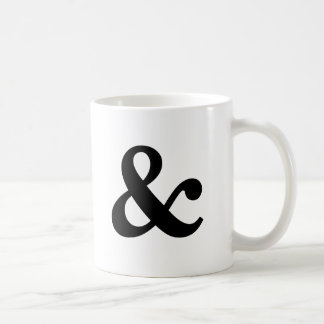 Svartvit et-teckenmugg kaffemugg