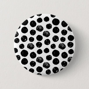 Svartvit hand plockadevattenfärgpolka dots knapp