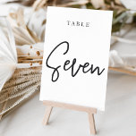 Svartvit handskript Bord SEVEN Bordsnummer<br><div class="desc">Enkla kort för bordsnummer och chic i klassiskt svartvitt gör en elegant påstående vid bröllop eller händelsen. Designfunktionerna "bord [nummer]" i en ögonetsande blandning av klassisk serif och handskriven skriptskrift. Utformningen upprepas på båda sidor. Individuellt numrerade kort som säljs separat. Beställ varje bordsnummer var för sig från vår samling.</div>