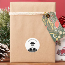 Svartvit kapsel och guldfärgad Studenten