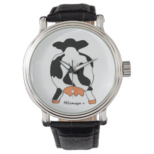 Svartvit ko bak klockan armbandsur