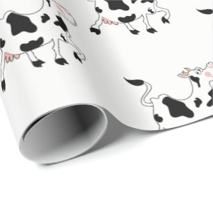 Svartvit ko som slår in papper presentpapper