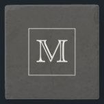 Svartvit monogram stenunderlägg<br><div class="desc">Den här stenens underlägg har en minimal design med din ursprungliga ram i en vit kvadrat på en svart bakgrund</div>