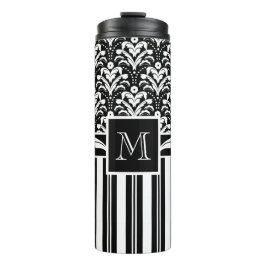 Svartvit, monogramåtercirkulerande Blommigt