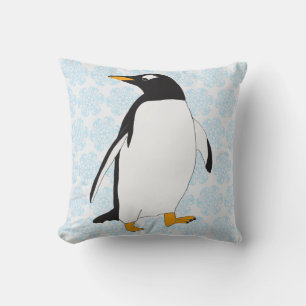 Svartvit penguin med orange fot och räkning kudde