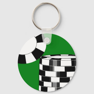 Svartvit poker chip på grönt nyckelring