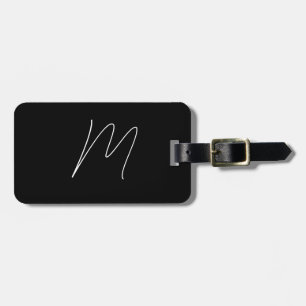 Svartvit skript med eget namn i monogram bagagebricka