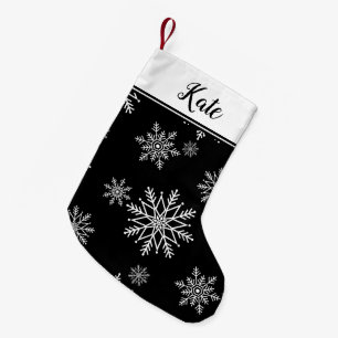 Svartvit snöflummel liten julstrumpa