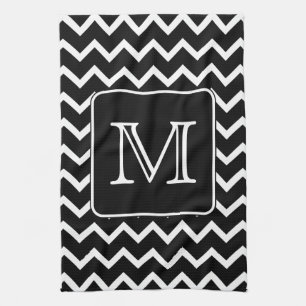 Svartvit sparre med den beställnings- monogram.en kökshandduk