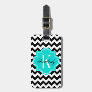 Svartvit sparre med den Turquoiose monogramen Bagagebricka