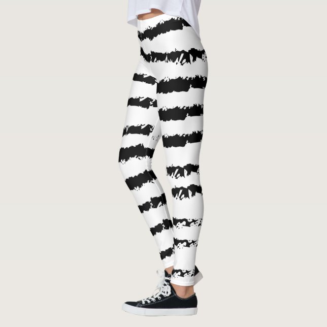 Svartvit strimlad leggings (Vänster)
