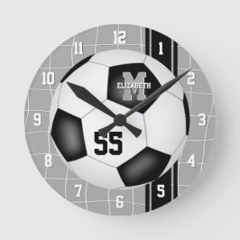 Svartvita flickor, pojkar av varisitet rand-fotbol rund klocka