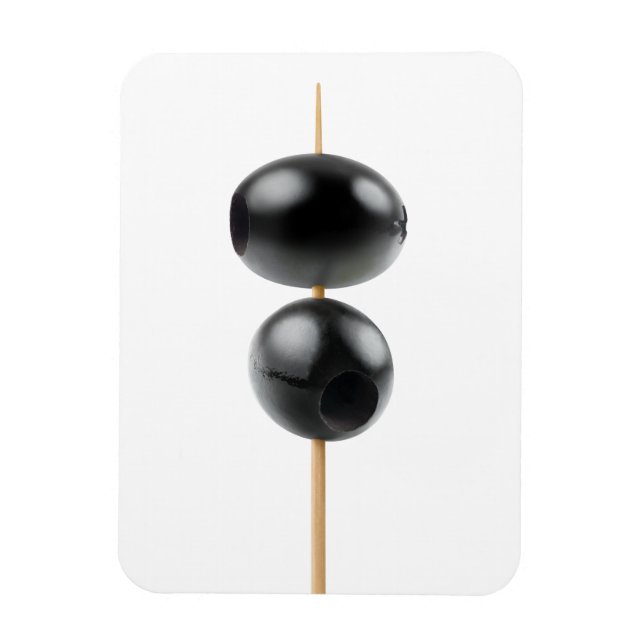 Svartvita oliver på ett skevningsmedel magnet (Vertikal)