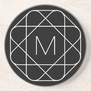 Svartvitt geometriskt monogram underlägg