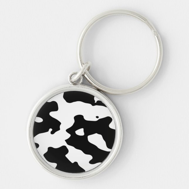 Svartvitt komönster rund silverfärgad nyckelring (Framsidan)