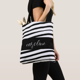 Svartvitt minimalistiskt monogram med stripe tygkasse