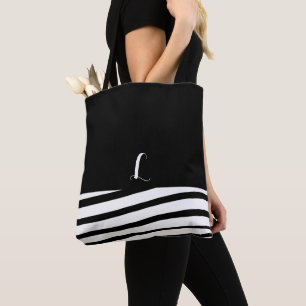 Svartvitt minimalistiskt monogram med stripe tygkasse