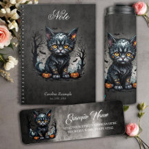 Halloween night with kittens and pumpkins.