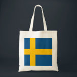 Sverige flagga Svenska Tygkasse<br><div class="desc">Sverige flagga - gult kor Den svenska flagga inspirerades troligtvis av den äldsta nordiska flagga - dansk Danneborg. Gult kor med blå bakgrund når kant i flagga och dess kortare arm ligger närmare den lämnat sidan av flagga. #Sverige #swedisch #yellowcross #nordic</div>