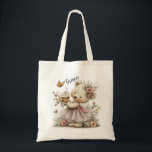 Sweet Floral Bear Illustration with Cupcake Charm Tygkasse<br><div class="desc">Sweet Floral Bear Illustration with Cupcake Charm A darling pastel illustration featuring an adorable bear in a pink dress and floral crown, holding a frosted cupcake and surrounded by delicate flowers and fluttering butterflies. Personalized with a graceful script name, this design blends gentle whimsy with a soft, storybook feel—perfect for...</div>