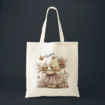 Sweet Floral Bear Illustration with Cupcake Charm Tygkasse<br><div class="desc">Sweet Floral Bear Illustration with Cupcake Charm A darling pastel illustration featuring an adorable bear in a pink dress and floral crown, holding a frosted cupcake and surrounded by delicate flowers and fluttering butterflies. Personalized with a graceful script name, this design blends gentle whimsy with a soft, storybook feel—perfect for...</div>