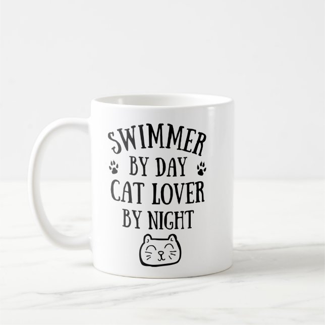 Swimmer by day. Cat lover by night. Kaffemugg (Vänster)