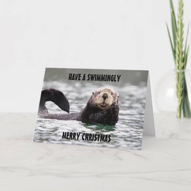 SWIMMINGLY GOD JUL/OTTERLY LYCKLIG N.Y. HELGKORT (Framsida)