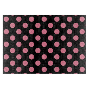 Swirly rosa polka dots på svart bakgrund