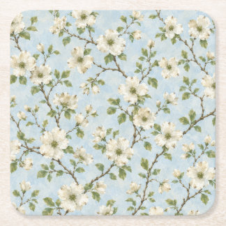 Sydlig blomsterdogwood-mönster på mjuk blå underlägg papper kvadrat